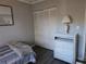 Bedroom with a dresser and closet at 4008 Oakview Dr # K3, Punta Gorda, FL 33980