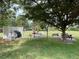 Community picnic area with tables and grills at 4008 Oakview Dr # K3, Punta Gorda, FL 33980