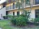 Condo building exterior with landscaped grounds at 4008 Oakview Dr # K3, Punta Gorda, FL 33980