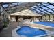 Relaxing pool and spa area with covered seating at 4008 Oakview Dr # K3, Punta Gorda, FL 33980