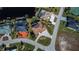 Aerial view of a luxurious home with a pool and landscaped yard, located on a corner lot at 4037 Bal Harbor Blvd, Punta Gorda, FL 33950