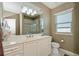 Clean bathroom with vanity, toilet, and shower at 4037 Bal Harbor Blvd, Punta Gorda, FL 33950