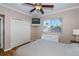 Bedroom with a double bed, walk-in closet, and TV at 4037 Bal Harbor Blvd, Punta Gorda, FL 33950