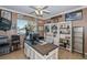 Spacious home office with built-in shelving and large desk at 4037 Bal Harbor Blvd, Punta Gorda, FL 33950