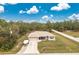 Single-story house with driveway and boat parking at 6104 Plamendon Ave, North Port, FL 34291