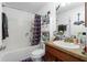 Bathroom with single vanity and bathtub at 6104 Plamendon Ave, North Port, FL 34291