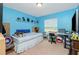 Bedroom with a queen bed and workspace at 6104 Plamendon Ave, North Port, FL 34291