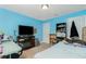 Bedroom with a queen bed and TV at 6104 Plamendon Ave, North Port, FL 34291