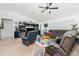 Vaulted ceiling living room with sectional sofa and entertainment center at 6104 Plamendon Ave, North Port, FL 34291