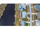 Home sits on a canal lot with solar panels at 6365 Scorpio Ave, North Port, FL 34287