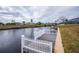 Private backyard with dock access to the canal at 6365 Scorpio Ave, North Port, FL 34287