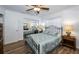 Bedroom with mirrored closet and metal bed frame at 6365 Scorpio Ave, North Port, FL 34287