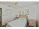 Bright bedroom with wicker furniture and ceiling fan at 6365 Scorpio Ave, North Port, FL 34287