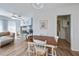 Dining area with wooden table and white chairs at 6365 Scorpio Ave, North Port, FL 34287
