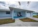 Newly renovated home with a covered porch at 6365 Scorpio Ave, North Port, FL 34287