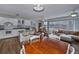 Open concept kitchen with island and living area view at 6365 Scorpio Ave, North Port, FL 34287