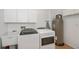 Clean laundry room with washer, dryer, and utility sink at 6365 Scorpio Ave, North Port, FL 34287