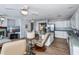 Living room with fireplace and large TV at 6365 Scorpio Ave, North Port, FL 34287