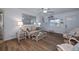 Bright living room with light flooring and comfy seating at 6365 Scorpio Ave, North Port, FL 34287