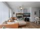 Bright living room with fireplace and water views at 6365 Scorpio Ave, North Port, FL 34287