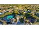 Community overview showcasing numerous houses and a waterway at 7342 N Ficus Tree, Punta Gorda, FL 33955