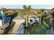 House with gray exterior and palm trees, aerial view at 7342 N Ficus Tree, Punta Gorda, FL 33955