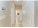 Clean hallway with tile flooring and linen closet at 7342 N Ficus Tree, Punta Gorda, FL 33955