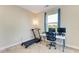 Home office with a treadmill, desk, and chair at 7342 N Ficus Tree, Punta Gorda, FL 33955