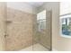 Large walk-in shower with glass enclosure and neutral tile at 7342 N Ficus Tree, Punta Gorda, FL 33955