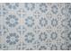 Close-up view of stylish blue and white floral bathroom tiles at 7424 S Moss Rose, Punta Gorda, FL 33955