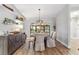 Bright dining room with large windows and wood floors at 7424 S Moss Rose, Punta Gorda, FL 33955