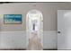 Bright hallway with light wood floors leading to other rooms at 7424 S Moss Rose, Punta Gorda, FL 33955