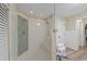 Large walk-in shower with mosaic tile and built in seat at 7424 S Moss Rose, Punta Gorda, FL 33955