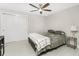 Spacious bedroom with ceiling fan and double doors at 760 Bal Harbor Blvd, Punta Gorda, FL 33950