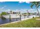 Private boat dock with lift, perfect for enjoying the water at 760 Bal Harbor Blvd, Punta Gorda, FL 33950