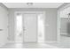 Interior entryway with white door and tile floor at 760 Bal Harbor Blvd, Punta Gorda, FL 33950