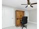 Home office with wood cabinet and ceiling fan at 760 Bal Harbor Blvd, Punta Gorda, FL 33950