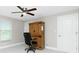 Home office with wood cabinet and ceiling fan at 760 Bal Harbor Blvd, Punta Gorda, FL 33950