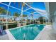 Refreshing screened pool with crystal-clear water and canal view at 760 Bal Harbor Blvd, Punta Gorda, FL 33950