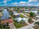 Aerial view of a single-Gathering home with a large backyard and pool at 840 Via Tunis, Punta Gorda, FL 33950