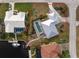 Aerial view of a home with a pool and canal access in a quiet community at 840 Via Tunis, Punta Gorda, FL 33950