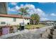 Outdoor kitchen, patio area, walkway to canal, lush landscaping at 840 Via Tunis, Punta Gorda, FL 33950