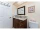 Bathroom with granite vanity and toilet at 840 Via Tunis, Punta Gorda, FL 33950