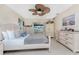 Bright bedroom with a king-size bed and ensuite access at 840 Via Tunis, Punta Gorda, FL 33950