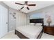 Bedroom with double bed, ceiling fan, and window at 840 Via Tunis, Punta Gorda, FL 33950