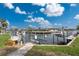 Private boat dock with lift in a canal front community at 840 Via Tunis, Punta Gorda, FL 33950