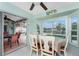 Bright breakfast nook with table and chairs, view of pool at 840 Via Tunis, Punta Gorda, FL 33950