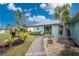 Landscaped walkway leading to the front door at 840 Via Tunis, Punta Gorda, FL 33950