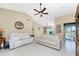 Living Room with vaulted ceiling, white sofas and views of backyard at 840 Via Tunis, Punta Gorda, FL 33950