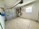 Attached garage with automatic opener and shelving at 8541 Regency Ct, North Port, FL 34287